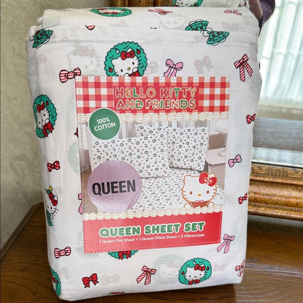Hello Kitty and Friends Queen size Pink and Green Holiday Sheet Set.